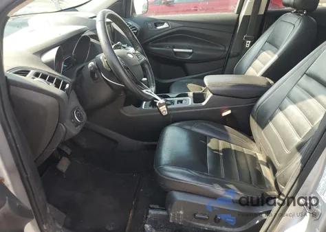 2017 Ford Escape Titanium z USA, uszkodzony, nr VIN 1FMCU9J98HUA58277